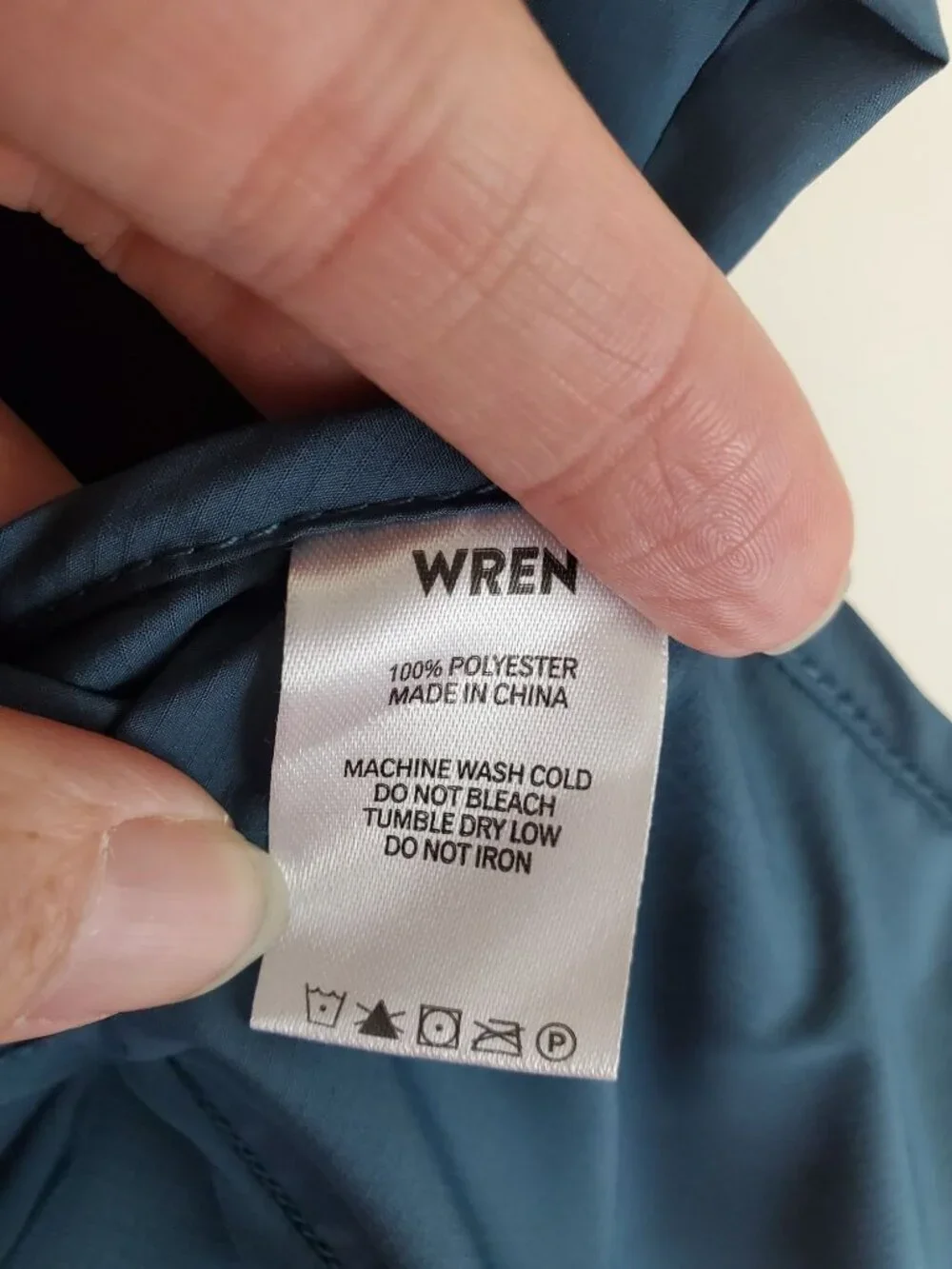 Wren men's 1/2 zip packable pullover windbreaker in Pacific Blue